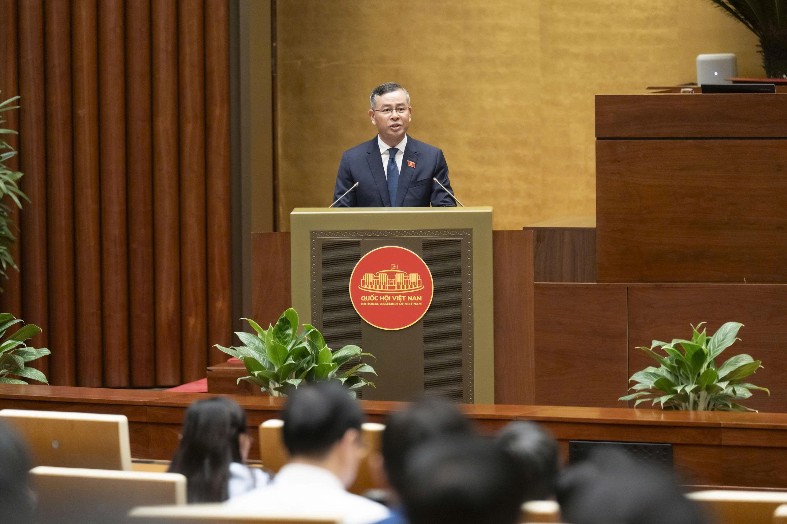 Bộ trưởng Bộ Tài chính trình bày Tờ trình về quyết toán ngân sách nhà nước năm 2024